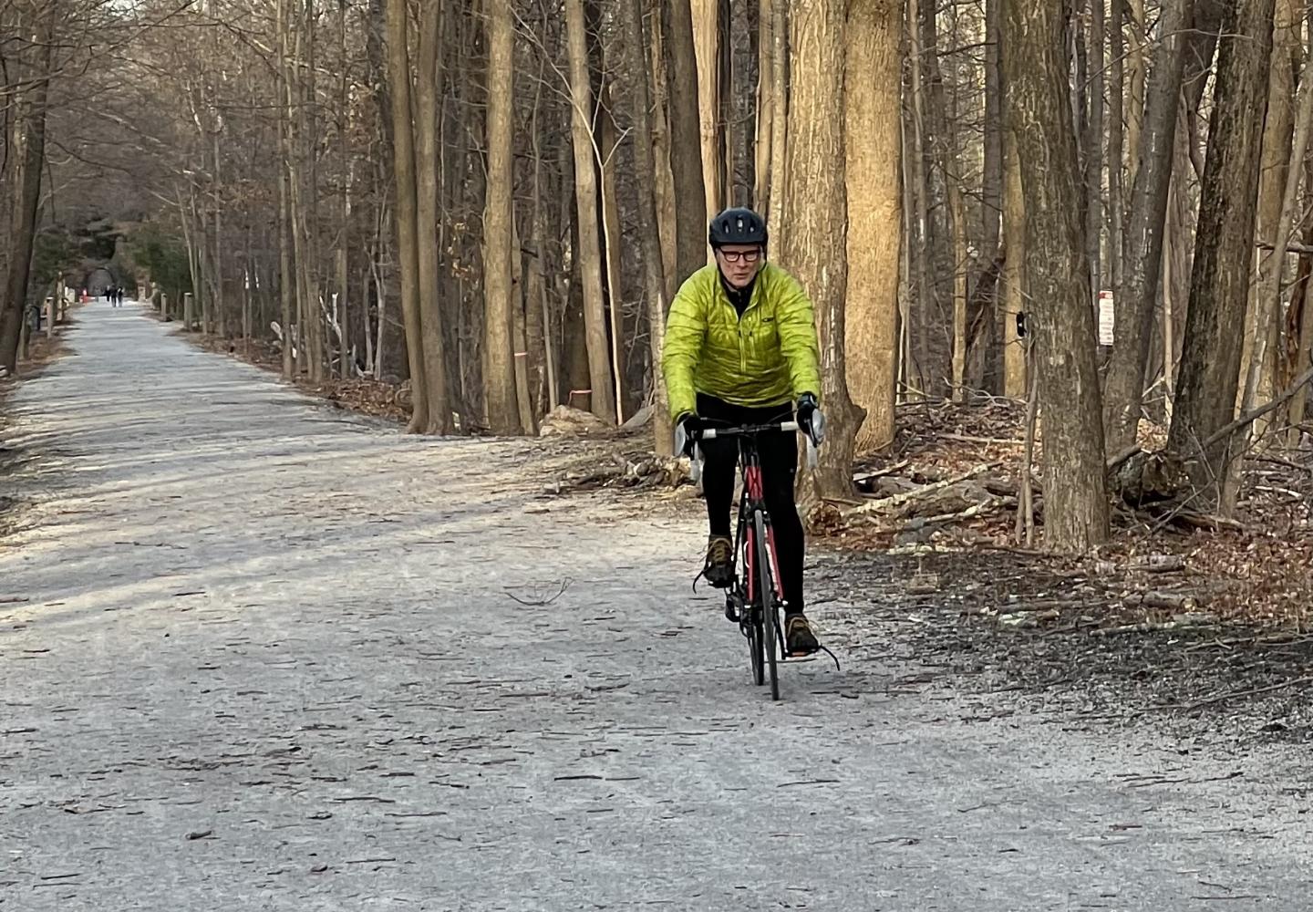 The author rides a stone dust trail similar to what the Adirondack Rail Trail will be. 