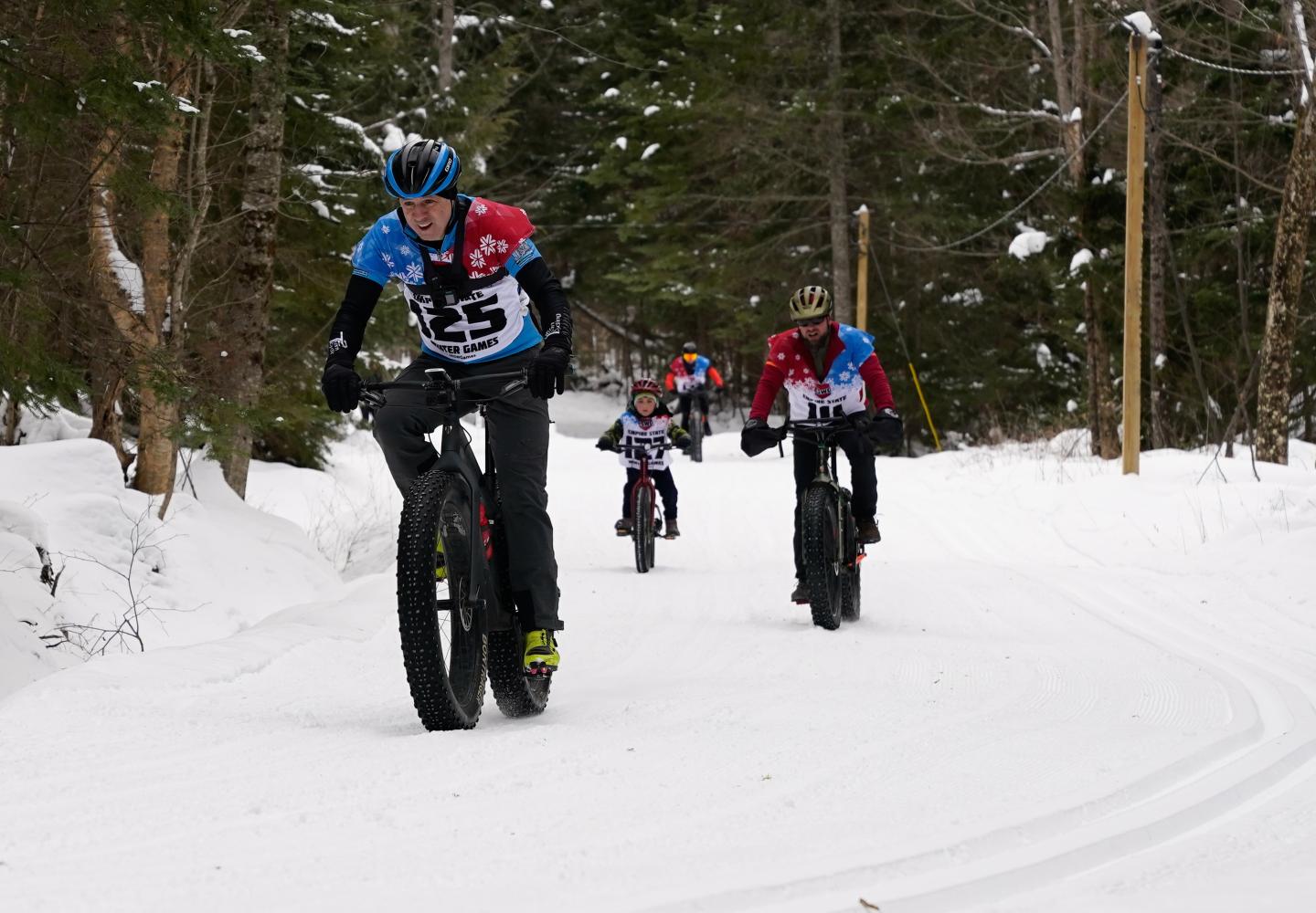A group of riders, including 6-year-old Riley Gobel enjoys the perfect race conditions at Dewey Mountain.