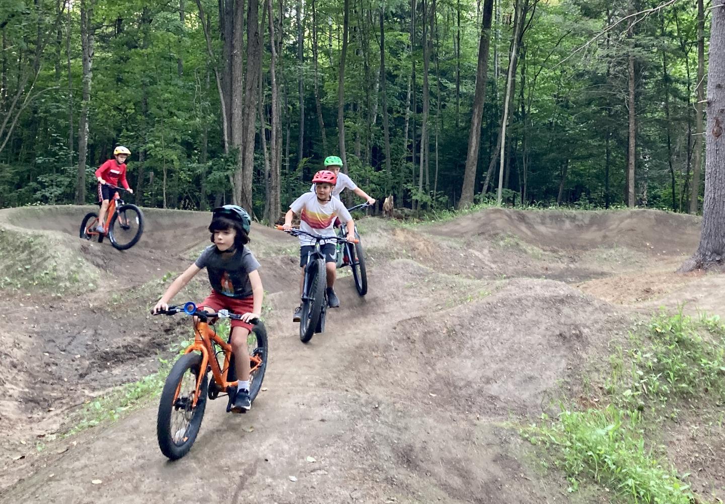 Local kids enjoy the new Harrietstown Bike Park opened last summer in Saranac Lake