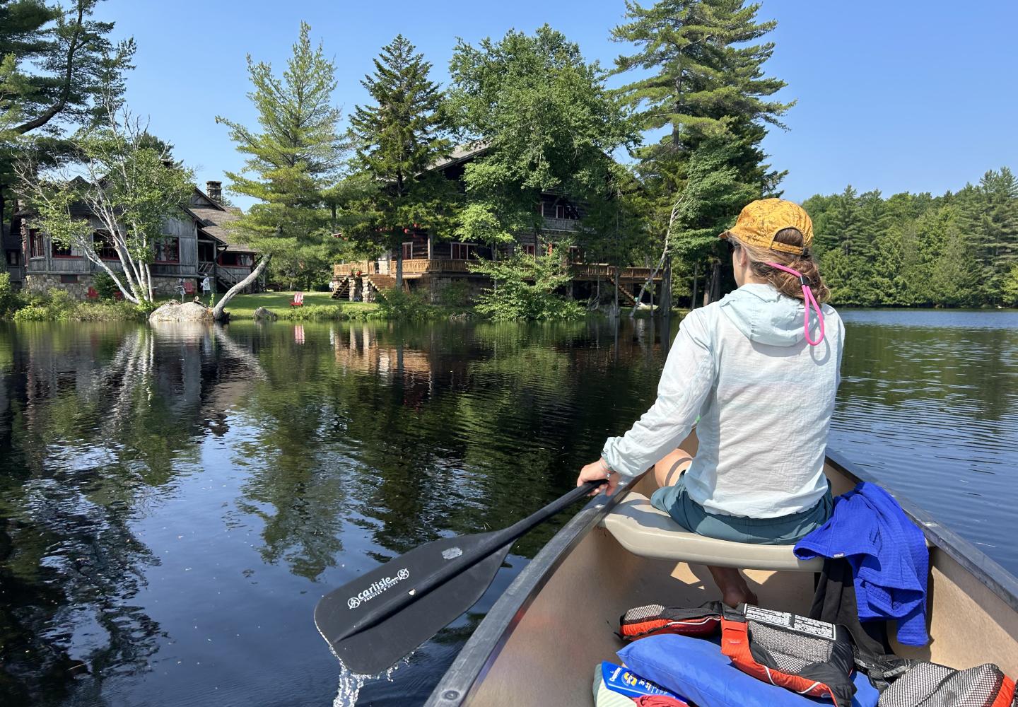 The serene waters of Sagamore Lake are a highlight of the Great Camp Sagamore Experience.