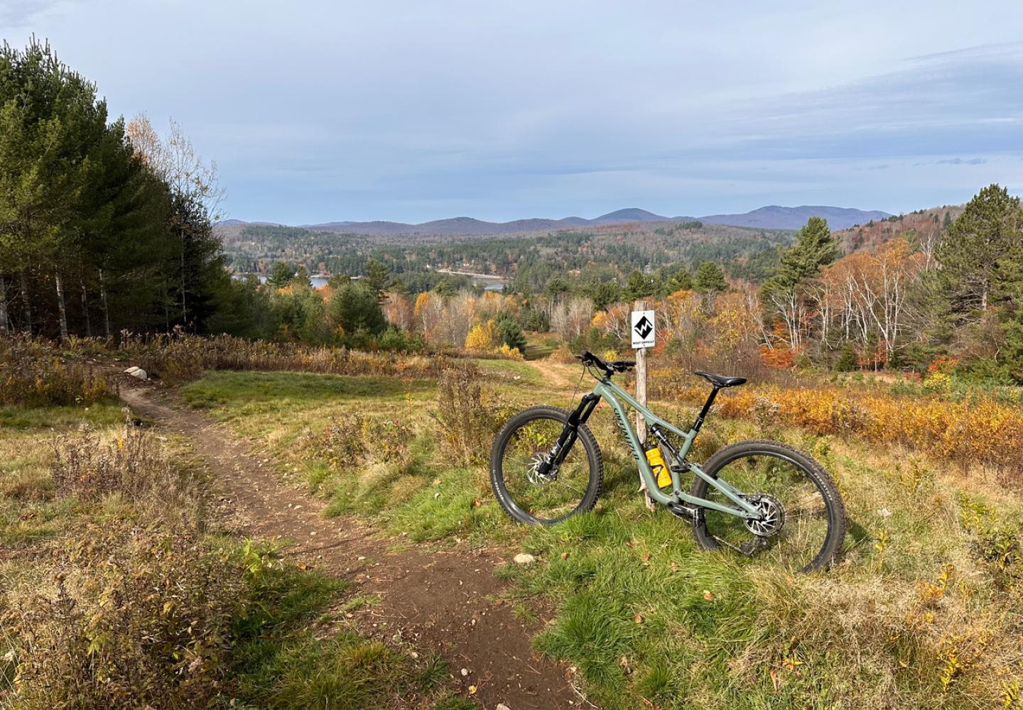 Bikers who make it to the top of Paint It Black will enjoy a fabulous view of the mountains near Long Lake.