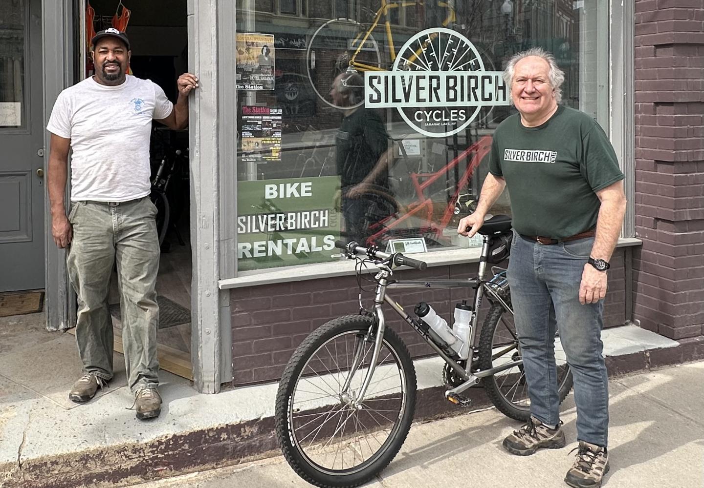 John Dimon (right) with Justin Oliver at Silver Birch Cycles in Saranac Lake