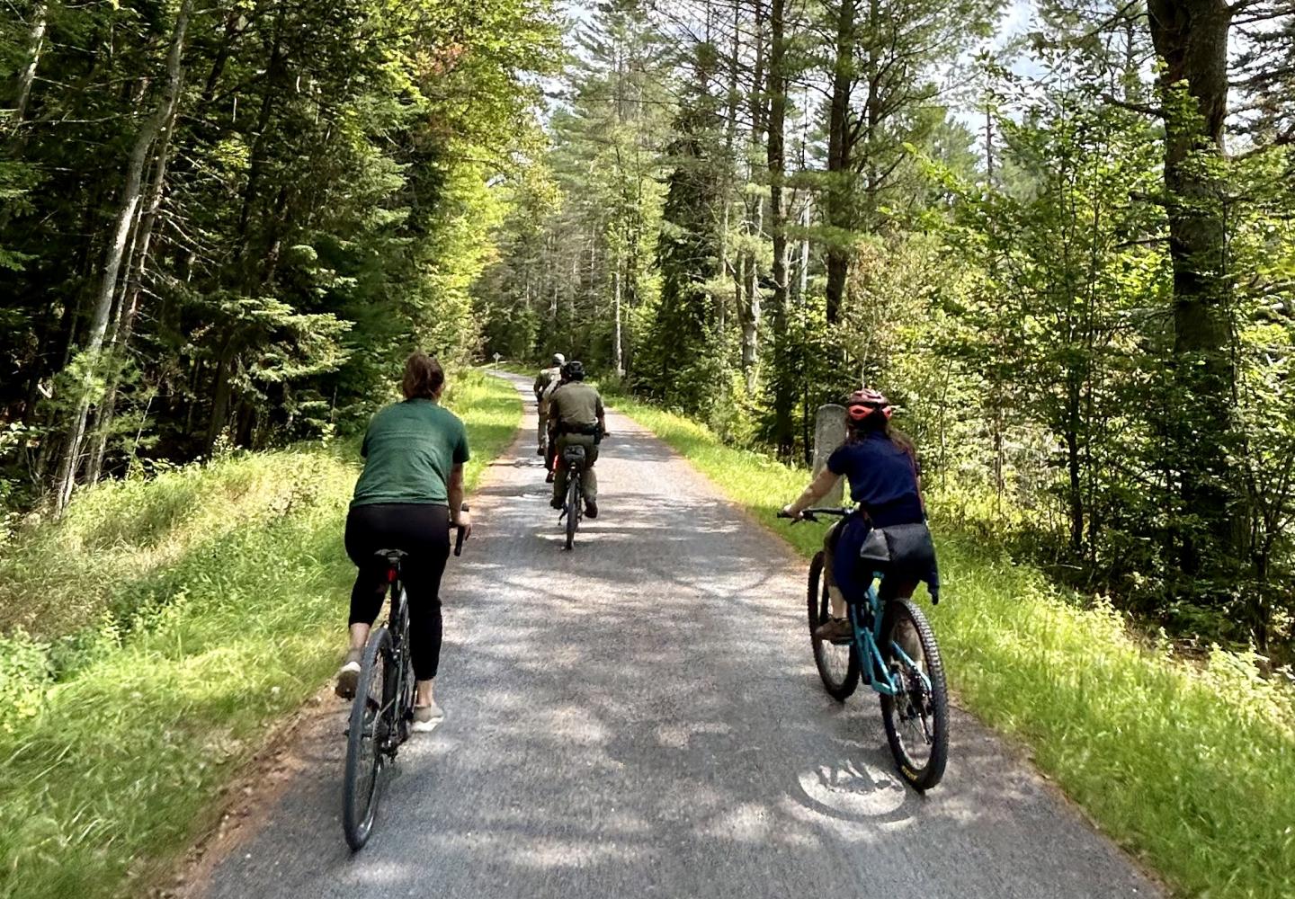 Cyclists enjoy a section of the Adirondack Rail Trail in Lake Clear.
