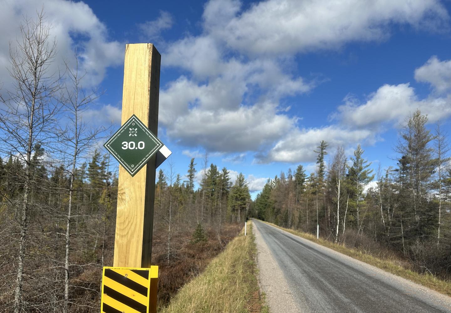 Mileage markers on the Adirondack Rail Trail