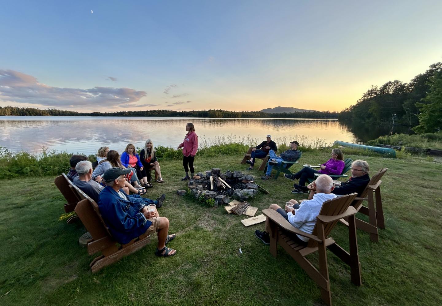 Weekender at Paul Smith's College guests relax and soak in the stunning lakefront views on campus.