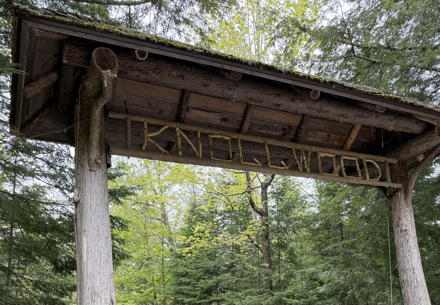 The Adirondack style gate at Knollwood on Forest Home Road