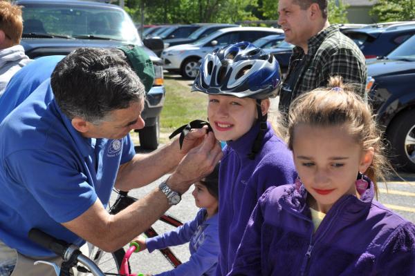 Proceeds from the Pat Stratton Ride have purchased 1,000s of helmets for area kids.
