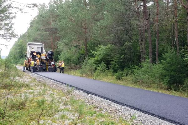 Paving of just over 2 miles of the Adirondack Rail Trail in Saranac Lake is underway.