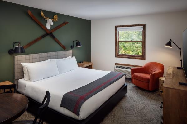 A standard king room at the Lodge at Schroon Lake