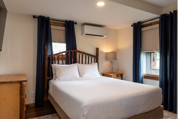 A king bedroom in a chalet at the Lodge at Schroon Lake